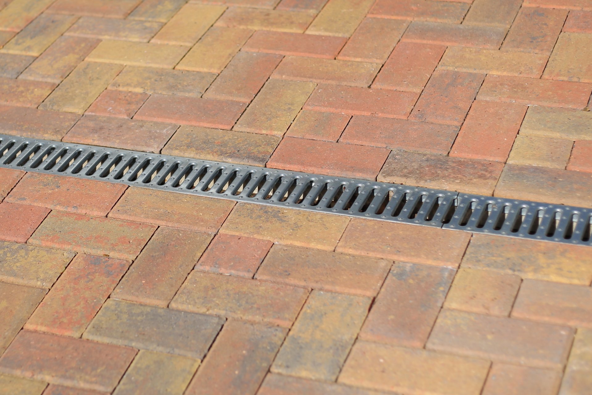 Professional Pavers showing perfect laid paving blocks with drainage